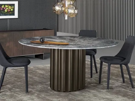 Tavolo Dorian Table con top in marmo e base in poliuretano finitura bronzo spazzolato di Bonaldo